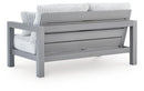 Hurley Park Outdoor Loveseat with Cushion - Ace Furniture and Decor