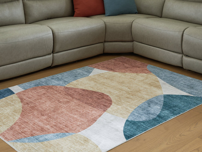Chanleigh Washable 5' x 7' Area Rug - Ace Furniture and Decor