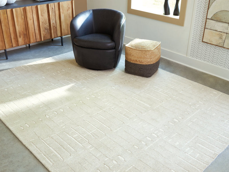 Wolbert 7'8" x 10' Area Rug - Ace Furniture and Decor