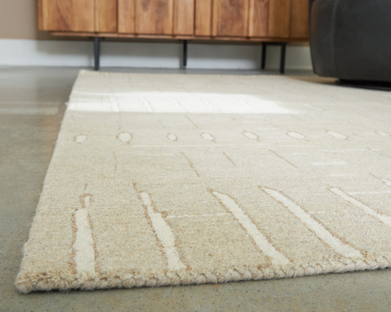 Wolbert 5' x 7' Area Rug - Ace Furniture and Decor