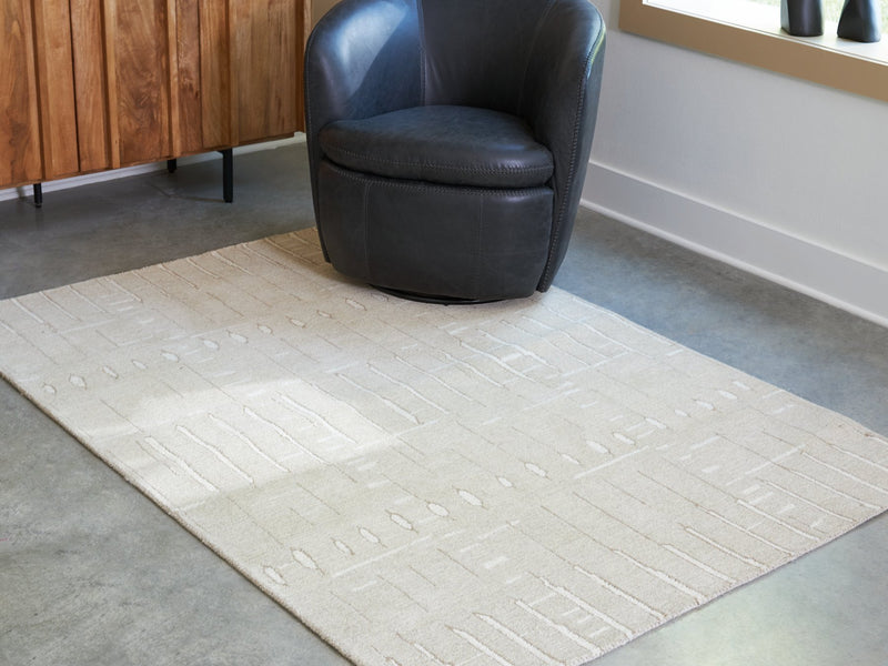 Wolbert 5' x 7' Area Rug - Ace Furniture and Decor